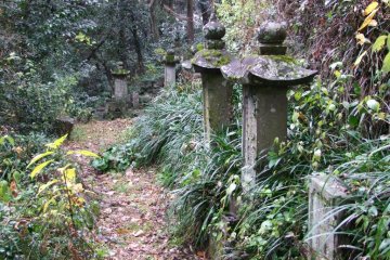 Gravestones often sit right along the path.