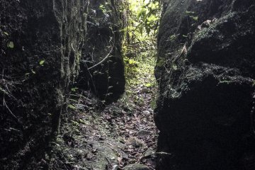 <p>If you're feeling adventurous, there are narrow passageways in between large stones. Just remember to take care as this is a completely open and unsupervised location.</p>