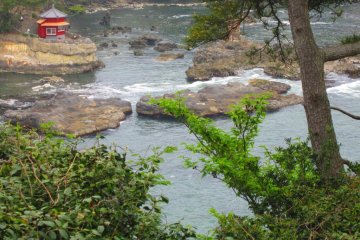 Rokkakudo as seen from the far cliffs, nestled among the craggy inlets of Izura