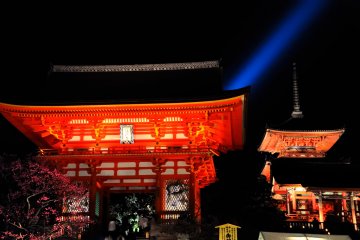 <p>A blue streak of light beaming at the temple gate and the pagoda</p>
