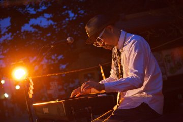 Performing outside the shrine