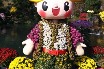 <p>This festival even has its own flower-clothed mascot</p>