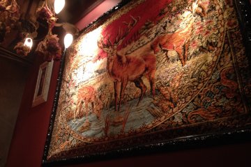 <p>Tapestries decorate the walls</p>