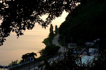 <p>The Oku-Biwako Parkway follows the edge of the lake</p>