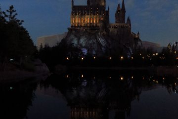 <p>Hogwarts at night with the Black Lake which is a special feature of the Japanese Universal Studios</p>