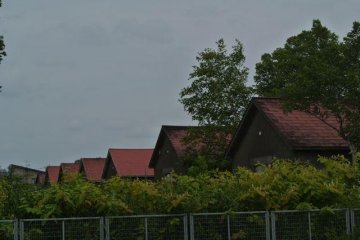 The factory is spread out over many buildings on spacious grounds