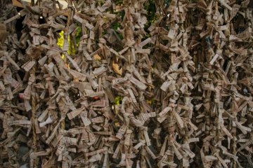<p>Papers with prayers tied on a rope.</p>