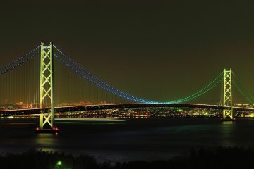 <p>Night view of Akashi Strait Bridge seen from Awaji Island, showing the time signal pattern.</p>