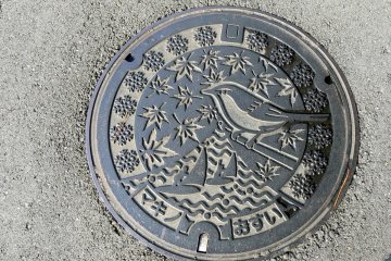 <p>Windsurfing, maple leaves and a border of snowflakes for Makino on Lake Biwa's North-Western shore</p>