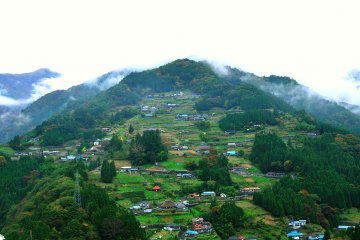 <p>The houses of Ochiai Village are built along stone-walled terraces</p>