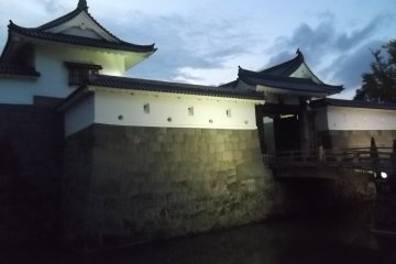 The turrets and gates are illuminated after dusk