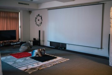 A big screen where you can use a projector to watch movies or play games