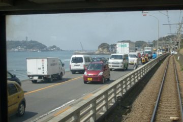 <p>The view of Enoshima from the train (it's better if you're not holding a camera)</p>