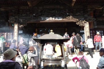 This is one of various temples where people come to offer prayers and requests.  It was crowded on the day we went.