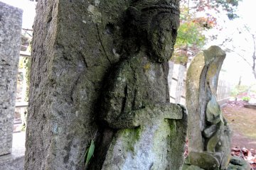 <p>Ancient looking Kannon statues. The other one doesn't have a head.</p>