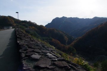 <p>On the dam, overlooking the edge</p>