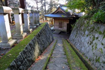 <p>The narrow stone steps going down from the Main Prayer Hall to Mikoshi-Den Hall</p>