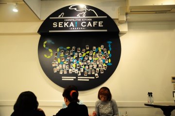 <p>The photo board with packed of visitors photograph taken with polaroid camera</p>