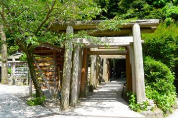 These series of wooden torii gates on the other end of a tunnel carved into the hill mark the entrance to the Zeniarai Benzaiten Temple.