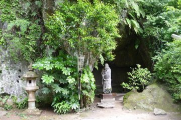 At the Jochiji Shrine, there is a happiness Buddha set in a cave.  You can rub his belly, finger, and ears for happiness and luck.