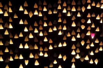 <p>A wall of carved bamboo emitting a calming, ethereal light.</p>