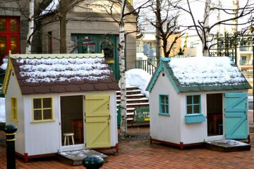 The first thing inside are these beautiful cute little 'furnished' houses in yellow, pink and blues. We could easily slide inside and take a snap or two of the tiny beds, tables and chairs. For children it definitely makes for a favorite hide-out.