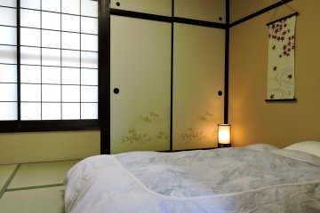 <p>Upstairs room with futon laid out &nbsp;</p>