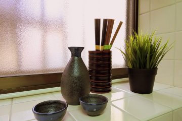 <p>Deep, tiled windowsill above the kitchen sink</p>