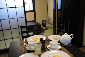 <p>There is a small dining table in the kitchen.</p>