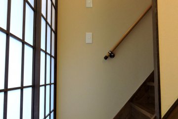 <p>Guest slippers at the bottom of the stairs</p>