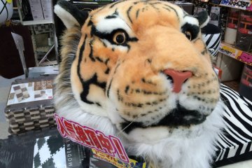 <p>You've always wanted a stuffed tiger's head on your bed, right?</p>