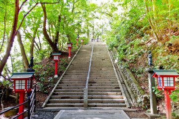 <p>The final staircase leading up to Yakuo-in Temple where you will notice many red lanterns and several black statues representing some of Takao`s many Guardian Deities</p>