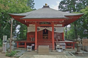 <p>Daishi-do Hall, yet another one of Yakuo-in Temple&rsquo;s pretty red structures</p>