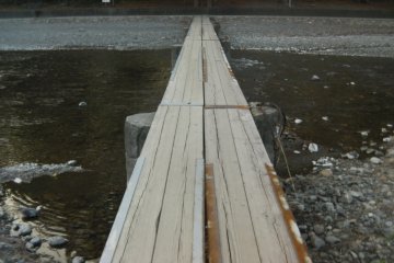 <p>Crossing the foot-bridge</p>
