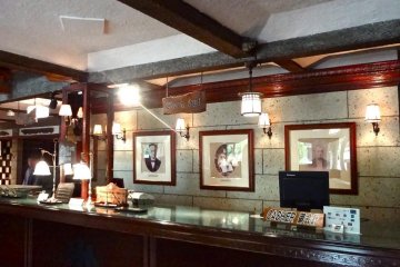 The front desk. Notice the three photos on the wall: One is Isabella Bird.