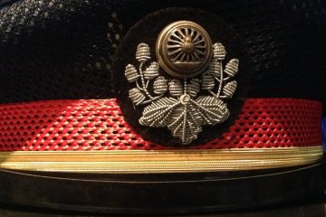 An old railway cap on display at&nbsp;Fukuchiyama Railway Museum.
