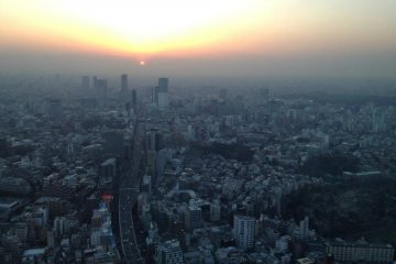 <p>Sun setting in the distance. On a clearer evening, Fuji would emerge to the right.&nbsp;</p>