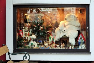 <p>Window showcasing Bukowski bears and German Christmas items</p>