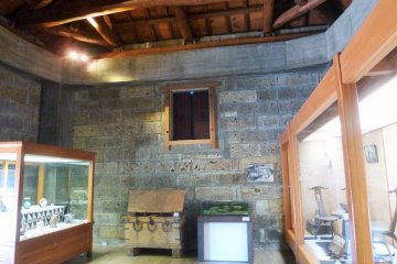 <p>Exhibits within a kura (traditional storage building)</p>