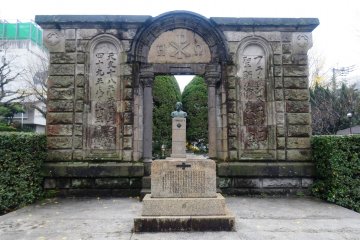 <p>A monument in the park across the street, built using stones from the old cathedral</p>