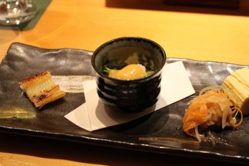 <p>Flame-broiled eel, served three ways</p>