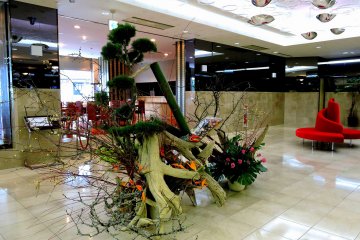 <p>New Year Decoration and a hotel cafe seen from the check-in counter</p>