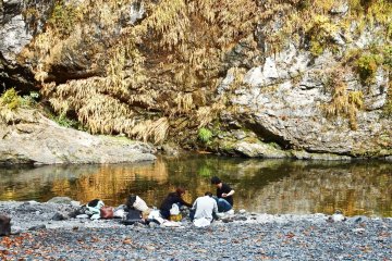 <p>Enjoying lunch by the river</p>