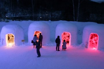 <p>People exploring the Yumoto Onsen Snow Festival</p>