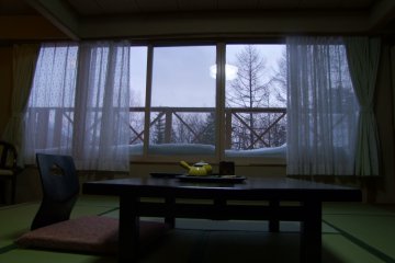 <p>Stay at a traditional Japanese ryokan or hotel</p>