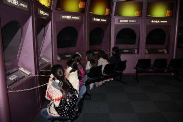 People listening to a constellation commentary