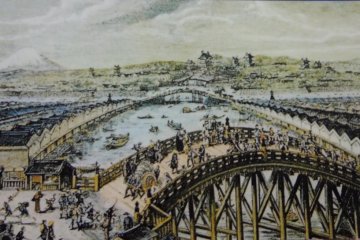 An artist's rendition of life on the river during the Edo Period. This is Nihonbashi Bridge.