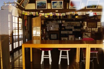 <p>A peek through the window of the rustic crafts house. Photography is prohibited inside some of the houses.</p>