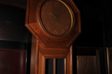 <p>Impressive wooden wall clock! It was ticking regularly but I wished time would stop this night!</p>
