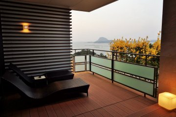 <p>Ocean view from the room's balcony. The private onsen bath is just out of view to the right.</p>
